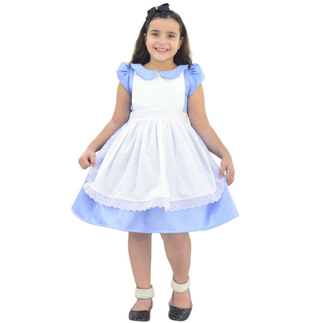 Vestido infantil temático disponível na loja oficial Moderna Meninas, usado como referência real de figurino para apresentação.