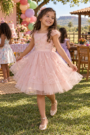 Vestido infantil para aniversário em Porteirão: guia por idade, tecido e ocasião
